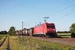 Am Abend des 13.06.2019 fuhr 185 315-9 mit einem gemischten Güterzug (Mannheim Rbf - Basel Bad Rbf) südlich von Buggingen über die KBS 703 durchs Rheintal in Richtung Schweiz.