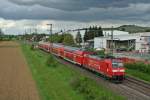 146 113-6 mit einem RE nach Basel Bad. Bf am 11.05.13 kurz nach dem Halt in Auggen.