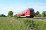 50 80 86-35 063-6 eingereiht in einem RE von Basel Bad. Bf nach Offenburg am 06.06.13 sdlich von Buggingen.