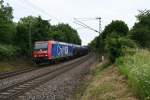 482 028-8 war auch am 25.06.13 wie zu erwarten mit einem Kesselzug unterwegs. Hier ist die Lok kurz vor Schallstadt in Richtung Norden unterwegs.