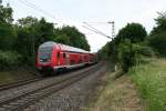 50 80 86-35 065-1 als Steuerwagen des RE 26514 von Basel Bad. Bf nach Offenburg am 25.06.13 in der Sdkurve von Schallstadt.
Schublok war 146 110-2.
