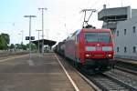 145 031-1 durchfuhr mit einem KLV-Zug am Morgen des 25.07.13 den Bahnhof Müllheim (Baden) in Richtung Süden.