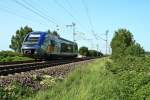 X73902 als IRE von Freiburg (Breisgau) Hbf nach Mulhouse-Ville am Nachmittag des 02.08.13 beim erreichen des Bahnhofsbereichs von Mllheim (Baden).