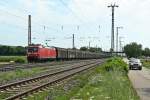 185 046-0 mit einem RedBull-Zug gen Norden am Nachmittag des 03.08.13 bei der Einfahrt in Müllheim (Baden) auf Gleis 13.