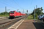 146 228-2 mit einer RB nach Neuenburg (Baden) am Vormittag des 15.08.13 bei der Einfahrt in den Bahnhof Orschweier.