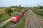 185 204-5 mit einem gemischten Güterzug gen Süden am Nachmittag des 28.09.13 bei der Einfahrt in's Gleis 13 in Müllheim (Baden).