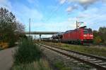 185 086-6 mit einem gemsichten Gterzug gen Sden am frhen Nachmittag des 09.11.13 bei der Einfahrt in den Bahnhof Mllheim (Baden).