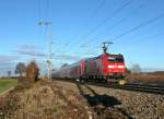 146 109-4 mit einem RE von Basel ber Freiburg (Breisgau) nach Offenburg am Nachmittag des 07.12.13 bei der Ausfahrt aus Mllheim (Baden).