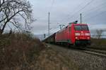 152 097-2 mit einem RedBull-Zug nach Bludenz am Nachmittag des 14.02.14 kurz nach dem Verlassen des Bahnhofsbereichs von Mllheim (Baden).
