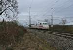 401 587-1 als ICE 274 von Basel SBB nach Berlin Ostbahnhof am Nachmittag des 14.02.14 sdlich von Mllheim (Baden).