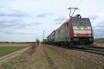 185 599-8 mit einem KLV-Zug in Richtung Schweiz am Nachmittag des 27.02.14 bei Hügelheim.