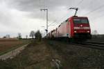 152 164-7 mit einem KLV-Zug in Richtung Weil am Rhein/Basel SBB Rbf am Nachmittag des 28.02.14 in Mllheim (Baden).