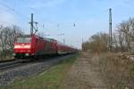 146 115 mit der RB 26568 von Neuenburg (Baden) nach Offenburg am Nachmittag des 27.03.14 beim Verlassen des Bahnhofs Heitersheim.