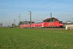 146 112-8 mit einem RE von Basel ber Freiburg (Breisgau) Hbf nach Offenburg am Nachmittag des 29.03.14 bei der Einfahrt in Auggen.