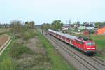 111 062-6 mit einer RB nach Offenburg am Nachmittag des 02.04.14 südlich des Haltepunktes Buggingen.