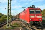185 131-0 durchfährt am Nachmittag des 17.04.14 mit einem gemischten Güterzug in Richtung Süden den Bahnhof Müllheim (Baden).