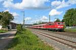 111 054 mit einer RB von Schliengen nach Offenburg am Nacnhmittag des 14.05.14 beim Verlassen des Bahnhofs Mllheim (Baden).