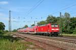 146 230-8 mit einem RE von Schliengen nach Offenburg am Nachmittag des 06.06.14 beim Verlassen des Bahnhofs Orschweier.