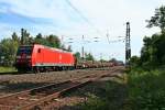 185 030-4 mit einem gemischten Güterzug von Basel SBB Rbf nach Mannheim Rbf am Nachmittag des 06.06.14 in Orschweier.