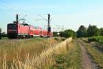 143 236-8 mit einer RB von Freiburg (Breisgau) Hbf nach Neuenburg (Baden) am Morgen des 03.07.14 westlich von Hgelheim.