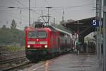 143 364-8 mit der HVZ-Verstrker-RB von Freiburg (Breisgau) Hbf nach Neuenburg (Baden) am Nachmittag des 30.07.14 beim Halt in Mllheim (Baden).