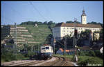 111102 am 27.5.1990 mit dem D 2199 Richtung Heilbronn vor der Deutschordensburg in Gundelsheim.