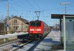 IRE 4711 mit Sonntglichem Verstrker durch 146 239-9 und deren Garnitur die Regulre zeiht 146 231-6 hier bei der Ausfahrt St.Georgen 11.1.09