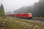146 230-8 taucht am frühherbstlichen Morgen des 9.9.2014 mit einem IRE nach Konstanz aus dem Nebel auf.