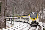 442 203+xxx als RE 14 Rottweil/Freudenstadt-Stuttgart am 22.01.2023 oberhalb von Stuttgart-Heslach.