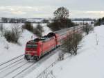 RE 19039 Stuttgart Hbf - Singen(Hohentwiel) mit Schublok 146 209 am 19.12.10 bei Gufelden.