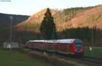 RE 19617 (Stuttgart Hbf-Singen(Hohentwiel)) mit Schublok 146 203-5 bei Gr�nholz 13.11.10