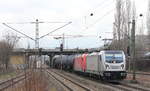 187 074 von Rheincargo mit Kesselwagenganzzug und Traxx 2 im Schlepp am 18.01.2019 in Stuttgart-Obertürkheim.