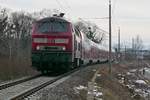 218 423-2 mit den Wagen des RE 5 / RE 4218, Lindau-Insel - Stuttgart, am 15.02.2021 bei Eriskirch.