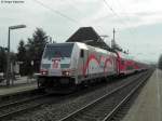 12.03.2011: Die 146 227-4 erreicht mit dem RE 19541 (Karlsruhe-Stuttgart) den Halt in Eutingen (Baden).