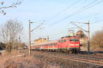 Am 28.12.2019 erreichen 111 212 (führend) und 111 043 mit RE Nürnberg-Stuttgart den Haltepunkt Eckartshausen-Ilshofen.