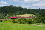 111 162 mit RE 19958 nach Stuttgart.Aufgenommen bei Mittelrot an der Murrbahn am 26.6.2015.