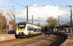 442 211 als RE19 Hessental-Stuttgart am 05.12.2021 in Waiblingen.