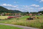 111 162 mit RE 19962 nach Stuttgart auf der Murrbahn bei Schleißweiler am 26.6.2015.