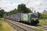 Wenzel Logistics 1193 900 durchfährt mit einem KLV-Zug den Bahnhof Roßtal, 24.06.2023