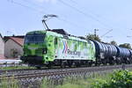 Mit einem reinrassigen Tankwagenzug kommt die RHC 132 034 am Mittag durch Thüngersheim gen Karlstadt gefahren. 7.9.2021