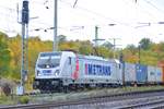 187 511-1 der Metrans Rail durchfährt den Bahnhof Neustadt Aisch bei leichtem Regen, aufgenommen am 23.10.2020.