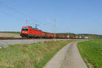 187 107 mit einem gemischten Güterzug bei Oberdachstetten Richtung Würzburg, 25.04.2020