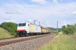 185 637 Railpool-PCT mit einem Autozug in Richtung Wrzburg.Aufnahme entstand in Mitteldachstetten am 18.7.2012