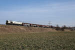 
DB Cargo 077 017 mit einem Güterzug bei Markt Schwaben a m 10.3.2026.