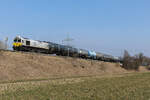 ECR 077 006-0 mit einem Kesselzug bei Markt Schwaben a m 10.3.2026.