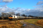 Euro Cargo Rail ECR 247 041 Class 77 mit einem Kesselwagenzug aufgenommen am 14.12.2019 auf der KBS 942 Burghausen-Mühldorf knapp vor der Haltestelle Heiligenstatt Richtung Mühldorf.