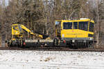 744 009 mit bayrischer Fahne von Rosenheim Richtung München am 18.2.26 bei Eglharting.