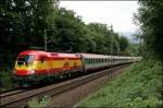 1116 232 wird mit dem OEC 663  WILKOMMEN IM PARLAMENT  auf der Fahrt von Feldkirch nach Wien West bei Oberaudorf abgelichtet. (04.07.2008)
