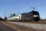 Die ES64 42-009 mit Metronom Waggons als Ersatzzug für den Meridian bei Übersee am 06.01.2014