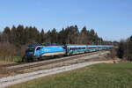 1216 249 war am 7. Februar 2023 mit dem  Klima-Railjet  bei Sossau im Chiemgau auf dem Weg nach Innsbruck.